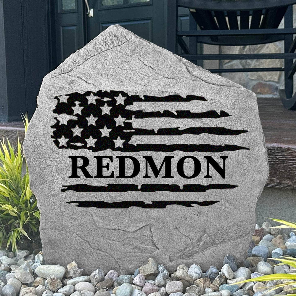 Personalized American flag name stone engraved with your family name, creating a patriotic centerpiece for front yards, gardens, and entryway landscaping.