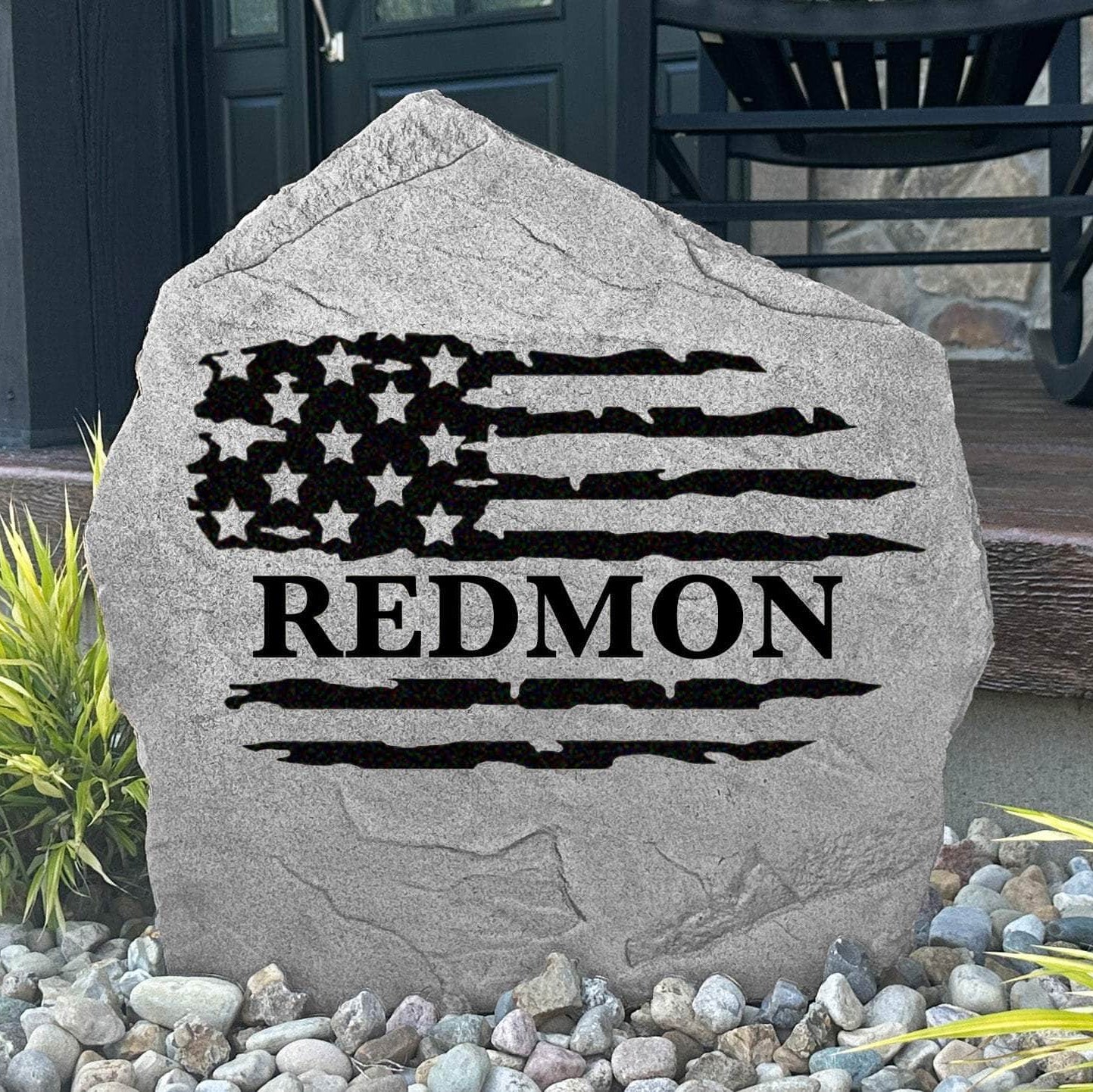 Personalized American flag name stone engraved with your family name, creating a patriotic centerpiece for front yards, gardens, and entryway landscaping.