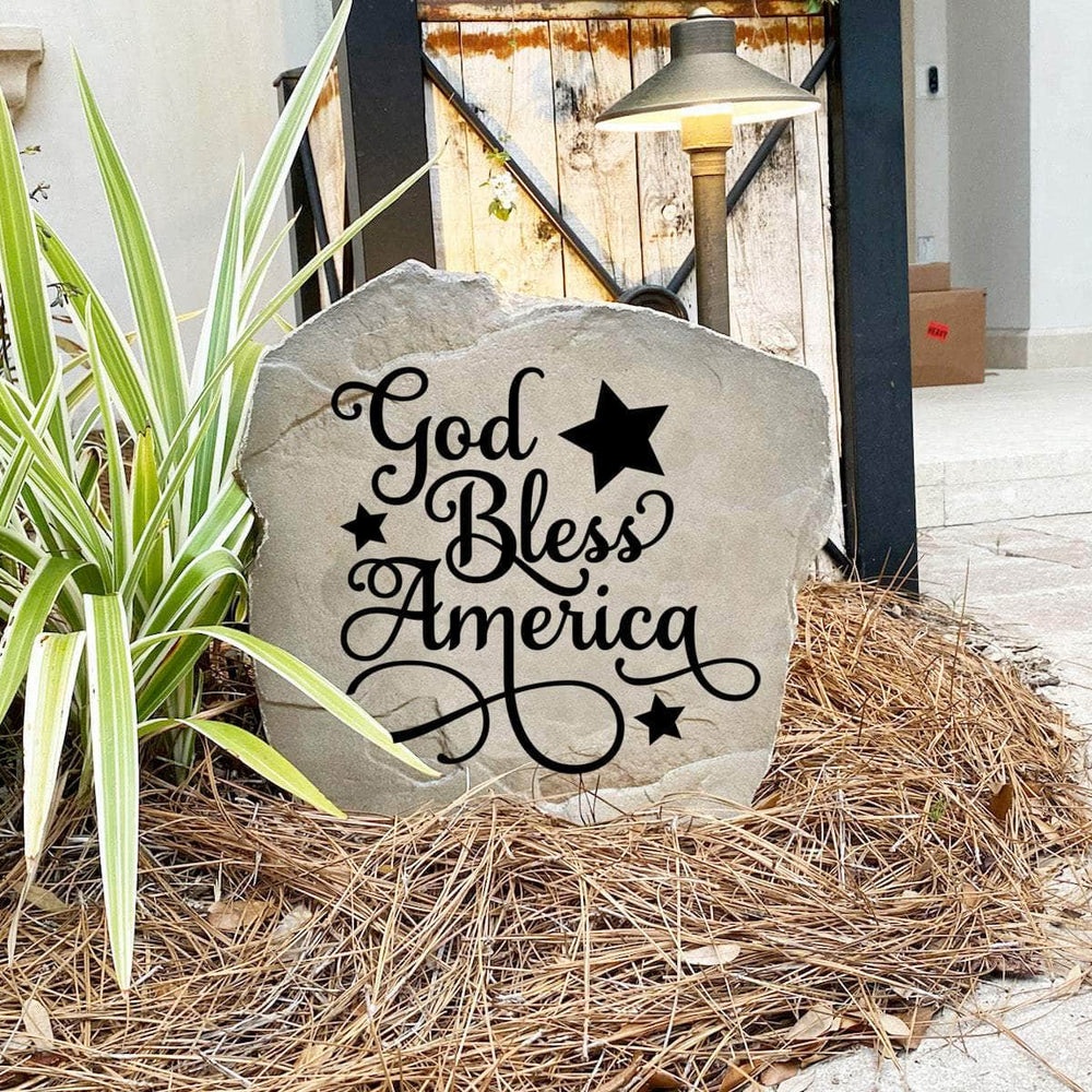 Decorative God Bless America Stone with permanently engraved patriotic details designed to enhance gardens, entryways, patios, and landscape borders. This outdoor accent celebrates American pride with lasting beauty.