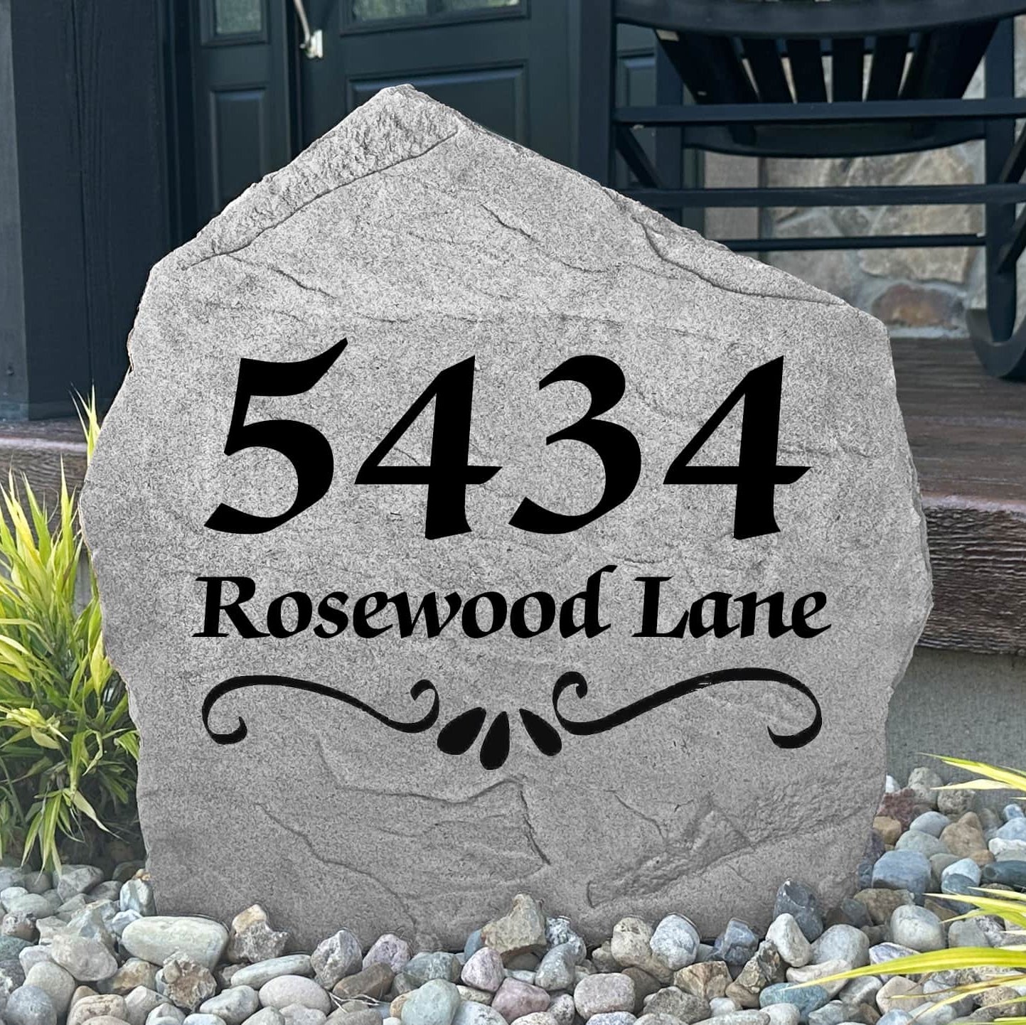Personalized Scroll Address Stone with custom house numbers and elegant scroll detailing engraved directly into the stone surface. This engraved address stone creates a beautiful house number marker that enhances curb appeal in front yards, gardens, walkways, and entryways.