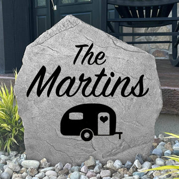 Personalized camper name stone engraved with your family name, creating a welcoming entrance for your campsite, travel trailer, or outdoor retreat.