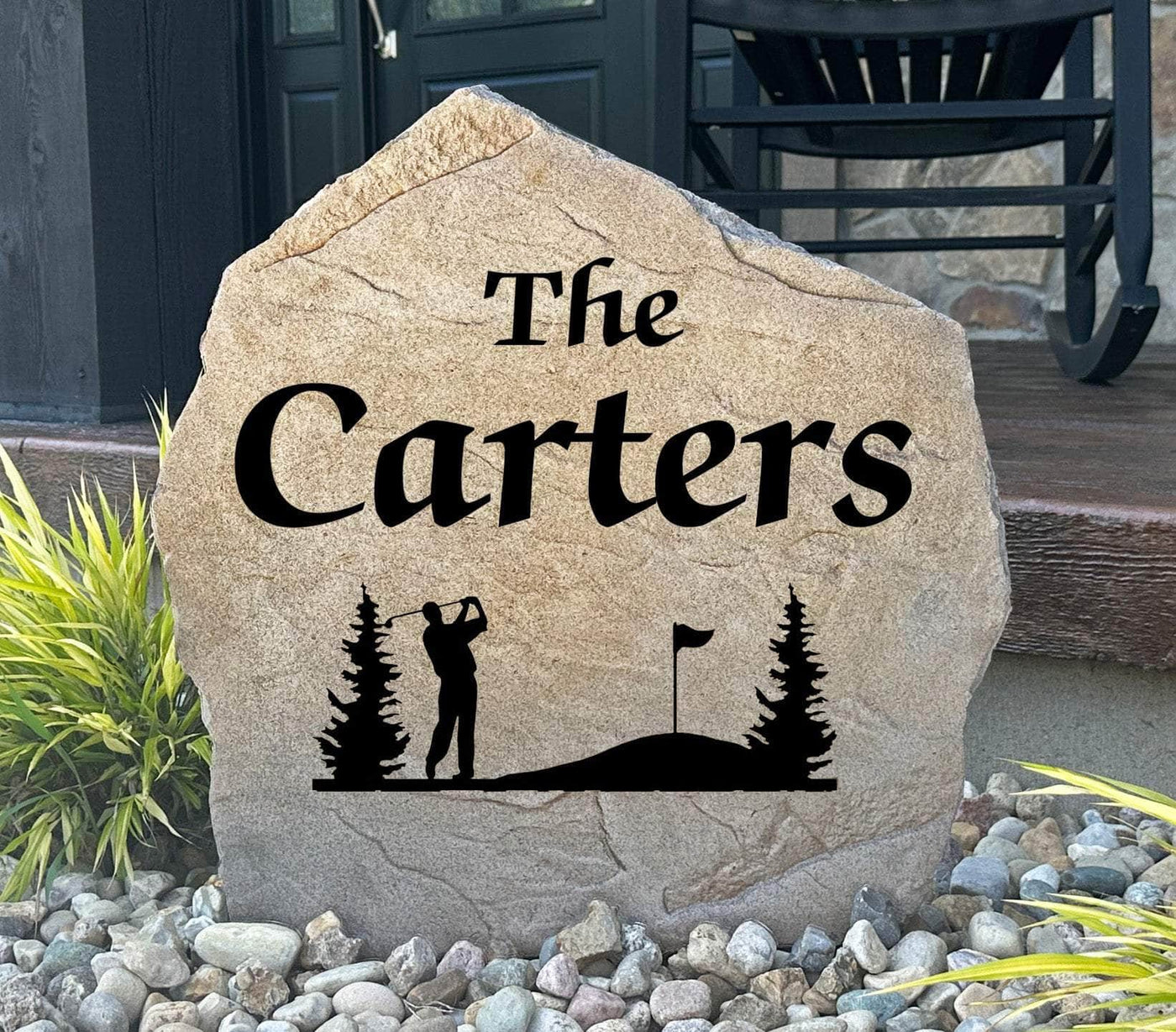 Personalized golf name stone featuring golfer silhouette and family name.