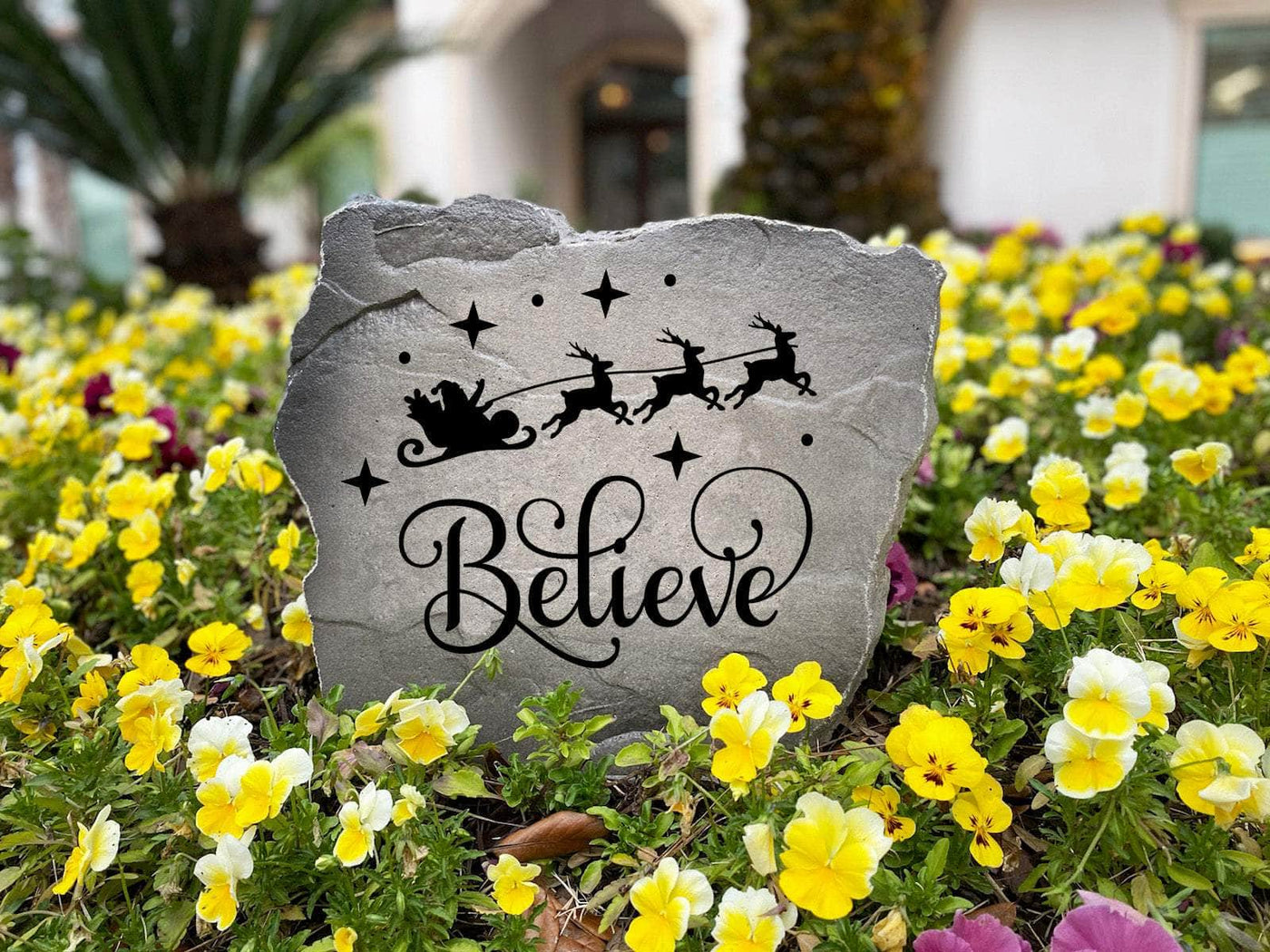 Engraved stone showcasing Believe message for holidays