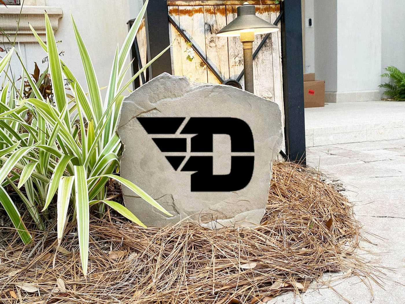 Durable Dayton logo rock with engraved logo for garden or yard signage.