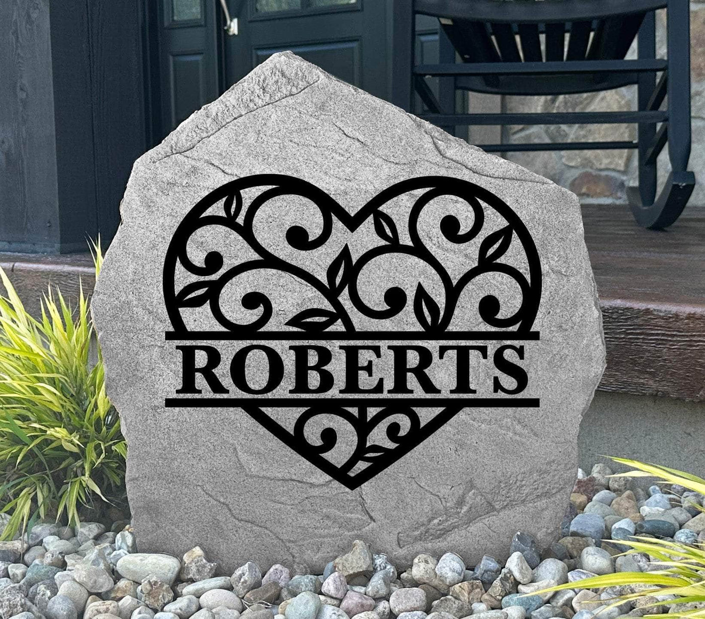 Engraved heart stone featuring a custom name design, ideal gift for families or couples.