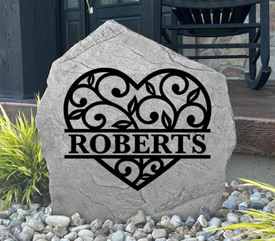 Engraved heart stone featuring a custom name design, ideal gift for families or couples.