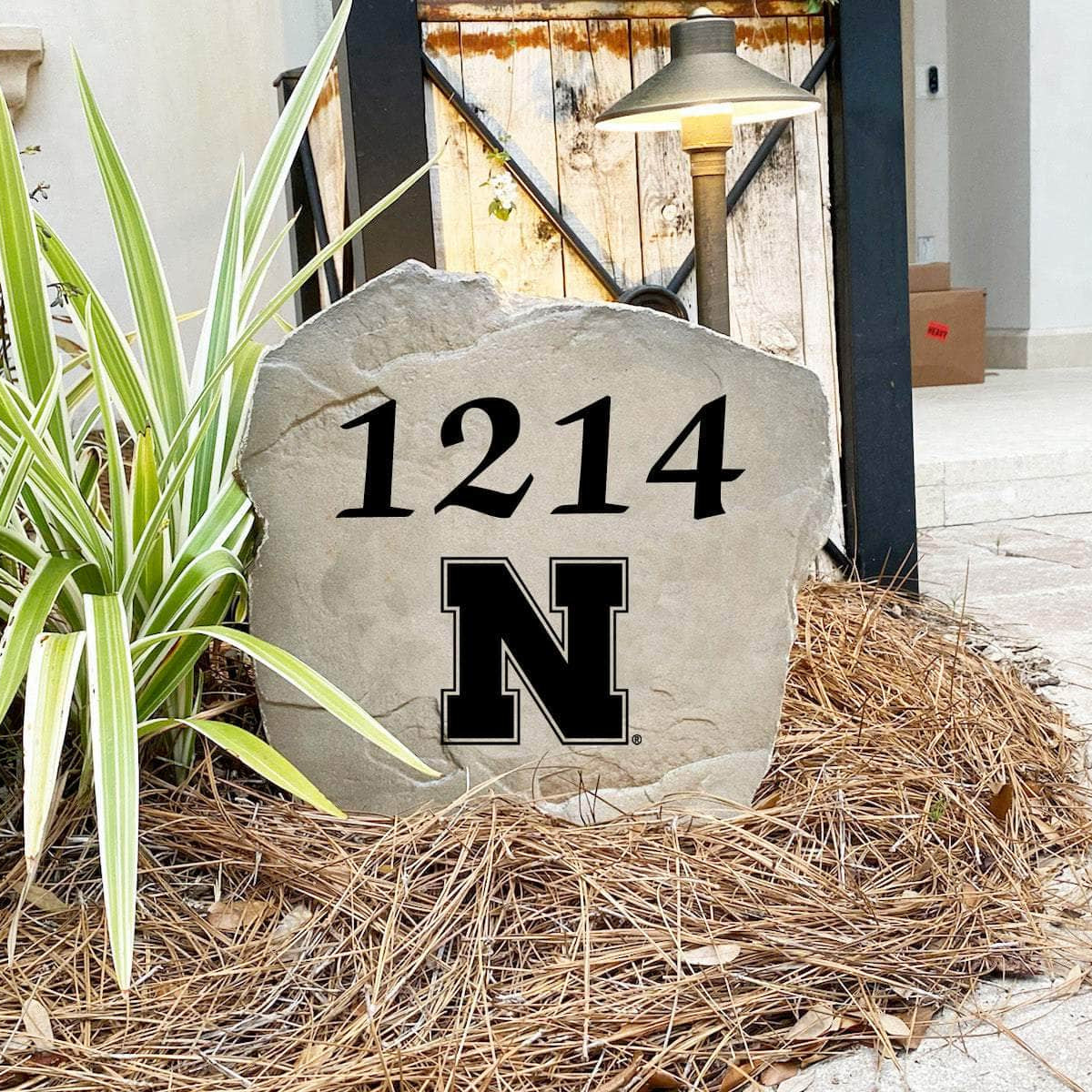 Made in the USA, this University of Nebraska Address Stone is deeply engraved into premium concrete for lasting durability in every season. Available in Sandstone and Greystone finishes.