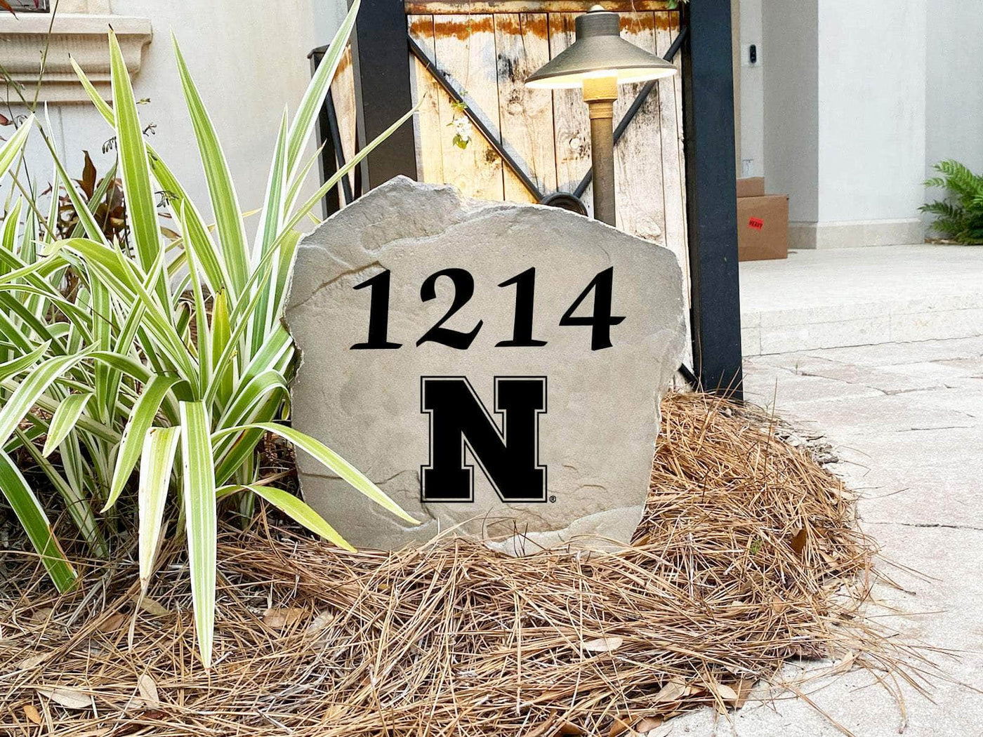 Durable Nebraska address rock with personalized engraving for home or yard.