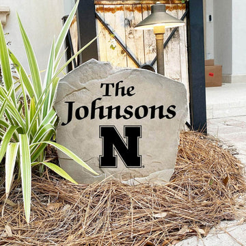 Decorative University of Nebraska lawn stone customized with your surname, creating a bold collegiate accent for gardens, walkways, patios, and entryways.