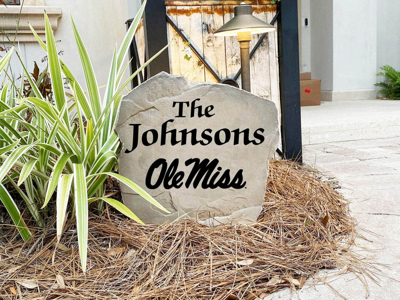 Durable Ole Miss name rock with personalized engraving for home decor.
