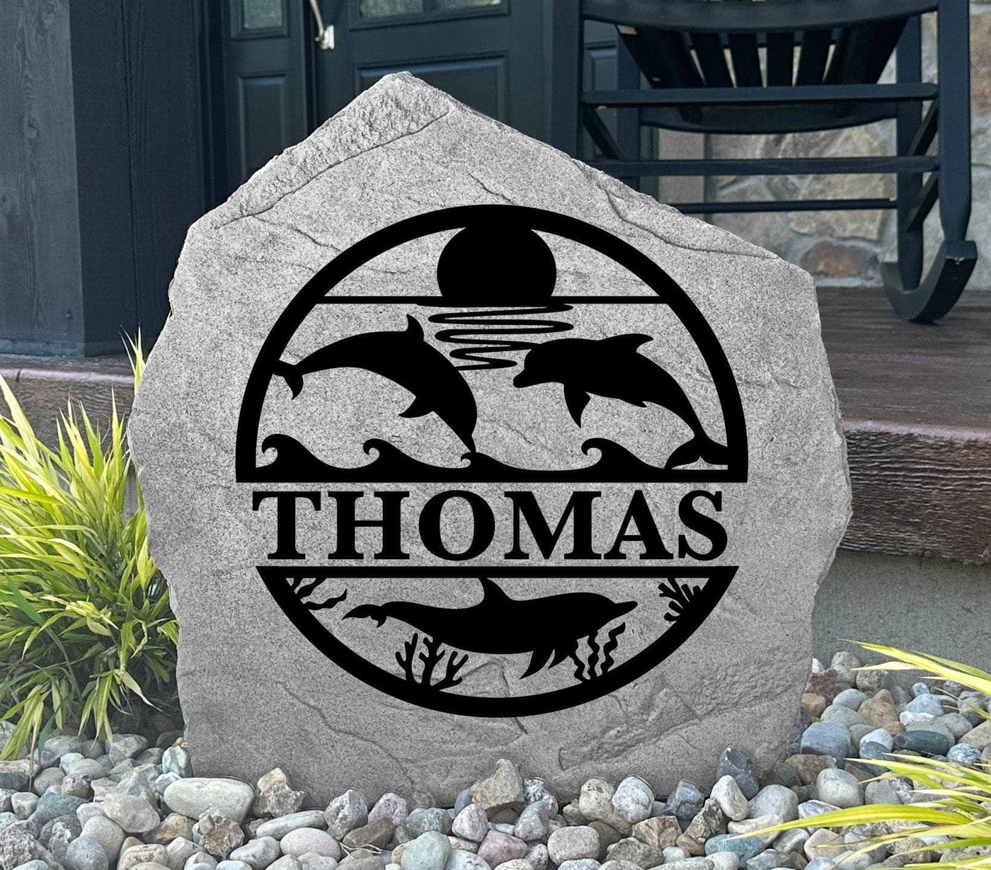 Engraved rock with sea life design and custom name, perfect for beach lovers.