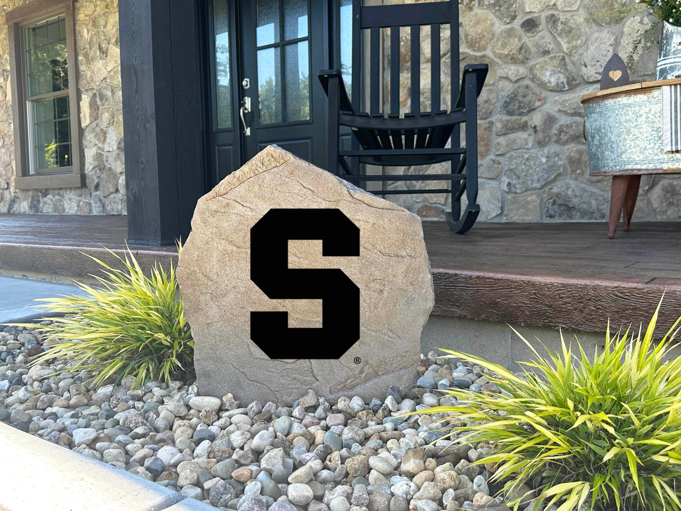 Outdoor decorative Syracuse University logo stone