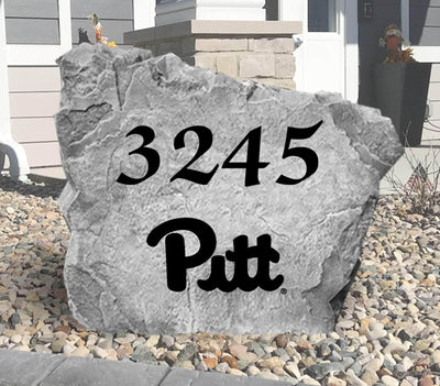 Outdoor landscaping rock featuring Pitt Panthers logo and house number