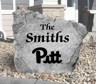 Outdoor landscaping rock featuring Pitt Panthers script