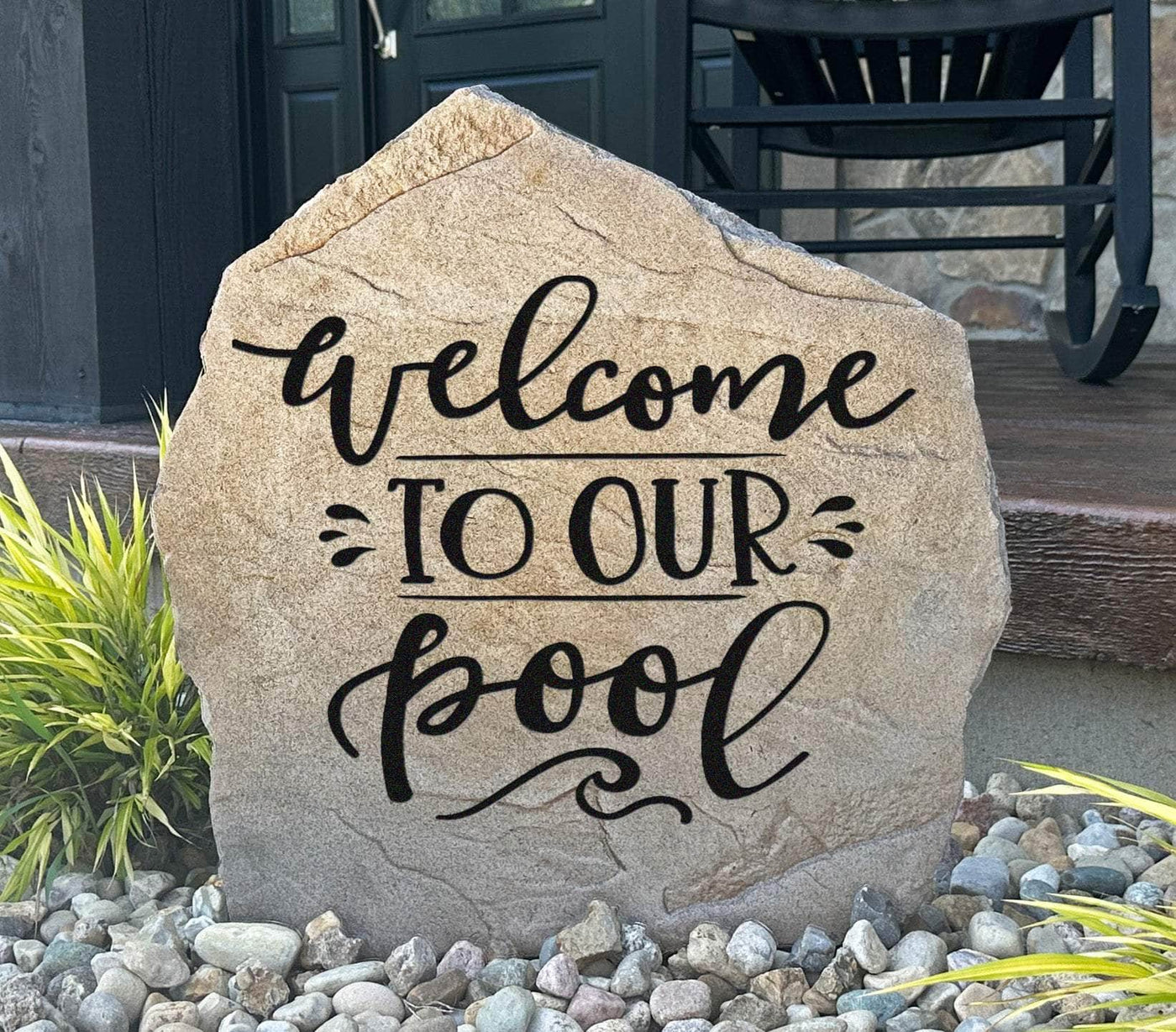 Decorative rock with welcome to our pool design for outdoor spaces
