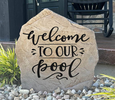 Decorative rock with welcome to our pool design for outdoor spaces