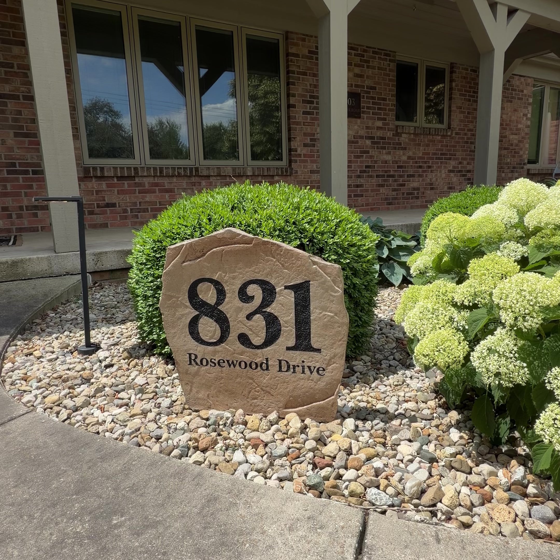 Decorative address landscape marker featuring precision-engraved street numbers, perfect for gardens, walkways, driveways, and front entryways.