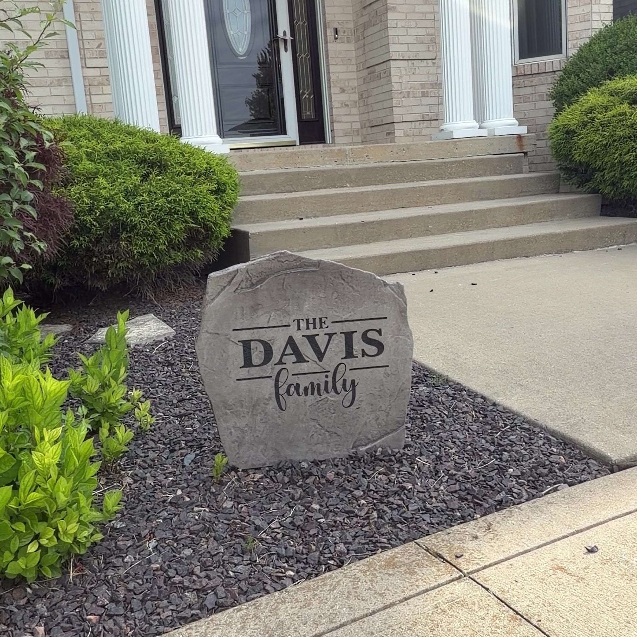 Engraved Family Name Stone with custom family names, bringing warmth and sophistication to front yard landscapes and outdoor living spaces. This weather-resistant garden stone provides lasting beauty and charm.