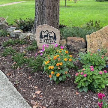 Personalized Deer Mountain Name Stone with engraved family name and outdoor mountain landscape design