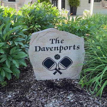 Personalized Pickleball Name Stone featuring a custom family name and detailed pickleball artwork engraved directly into the stone surface. This decorative garden stone adds personality and curb appeal to front yards, patios, gardens, and pickleball enthusiasts' homes