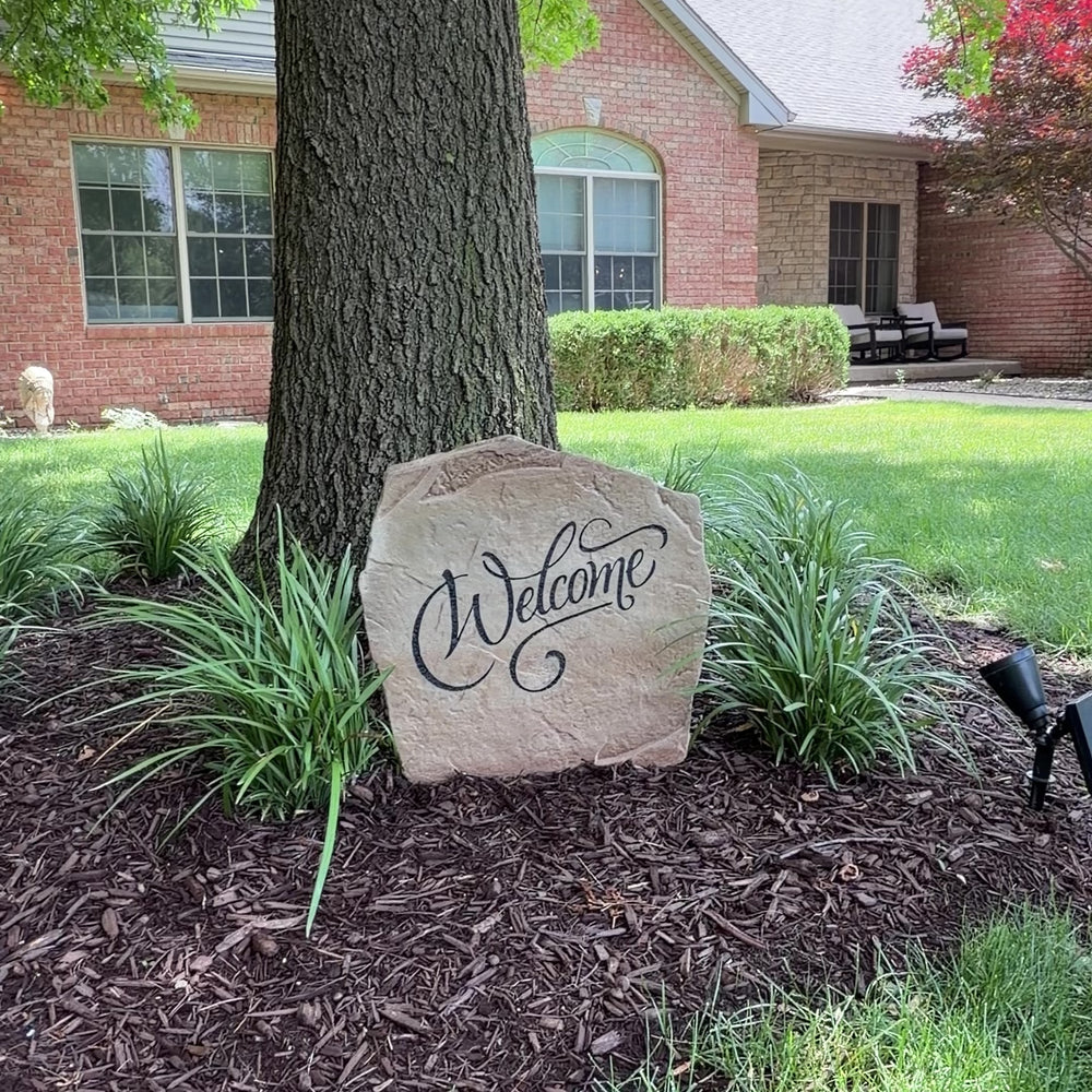 Video showcasing the Welcome Stone, a personalized engraved welcome stone designed to create a warm and inviting entrance. Displayed outdoors to highlight its timeless beauty, durable craftsmanship, and the elegant curb appeal it adds to a front yard, garden, patio, or entryway.