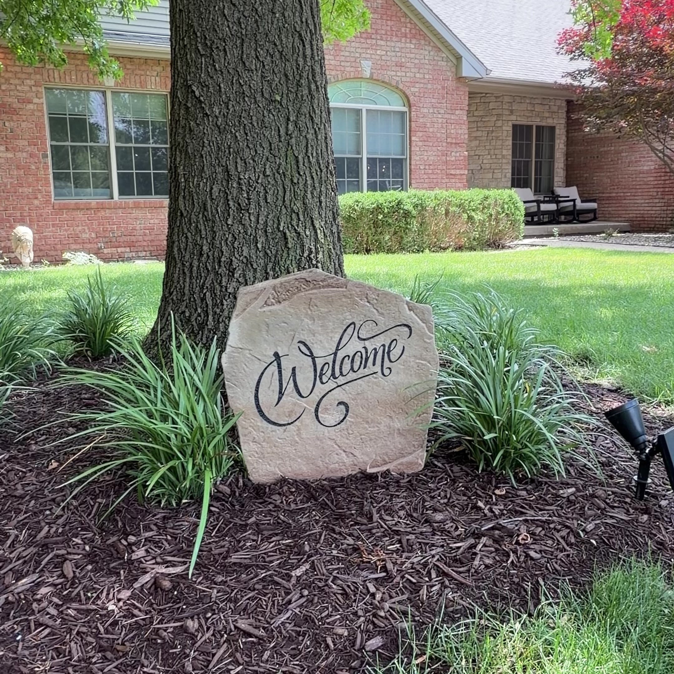 Video showcasing the Welcome Stone, a personalized engraved welcome stone designed to create a warm and inviting entrance. Displayed outdoors to highlight its timeless beauty, durable craftsmanship, and the elegant curb appeal it adds to a front yard, garden, patio, or entryway.