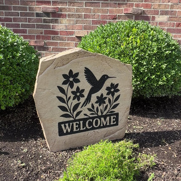 Welcome Bird engraved stone featuring a graceful bird design that creates a warm and inviting entrance for your home's landscape.
