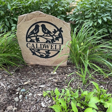 Personalized Love Birds Monogram Stone featuring your family initial with two lovebirds, creating a charming centerpiece for gardens and front entrances.