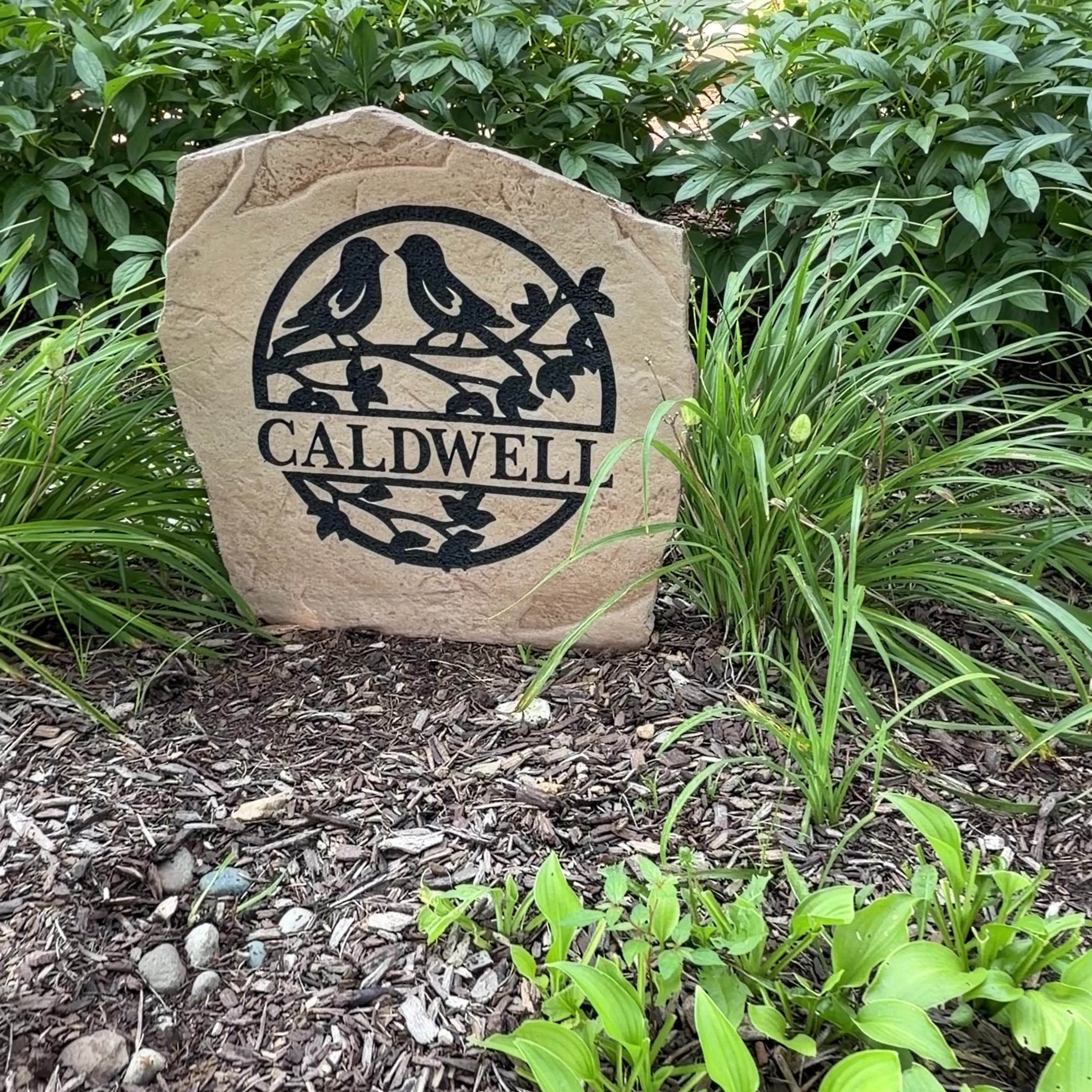 Personalized Love Birds Monogram Stone featuring your family initial with two lovebirds, creating a charming centerpiece for gardens and front entrances.