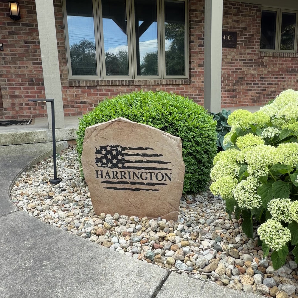 Decorative patriotic family name plaque featuring an engraved American flag design, perfect for enhancing curb appeal and outdoor living spaces.