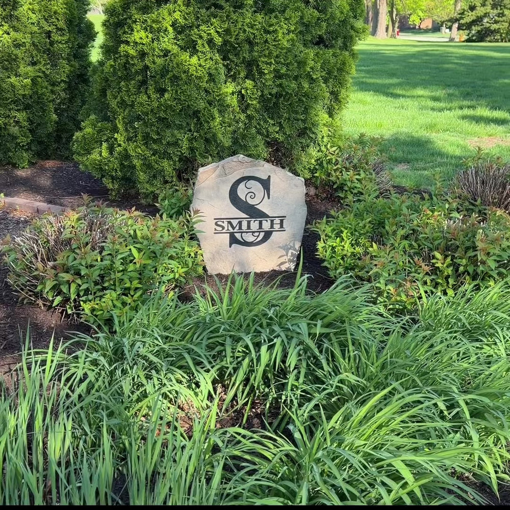 Decorative luxury monogram landscape stone showcasing a beautifully engraved initial that enhances flower beds, patios, and residential curb appeal.
