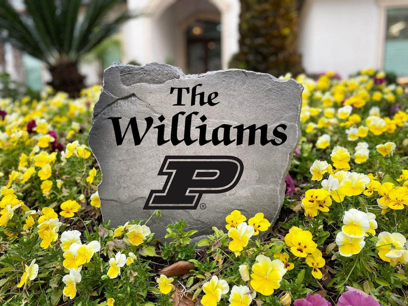 Engraved Purdue name stone adding school pride to outdoor décor