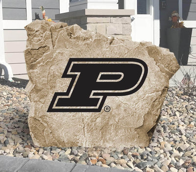 Purdue University engraved logo stone in landscaped garden