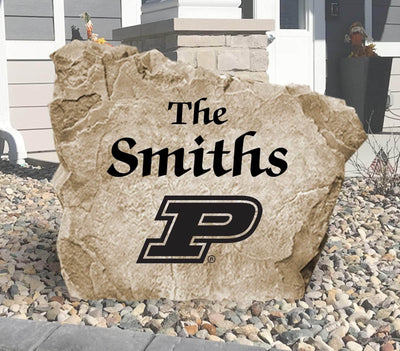 Purdue University engraved name stone in landscaped front yard