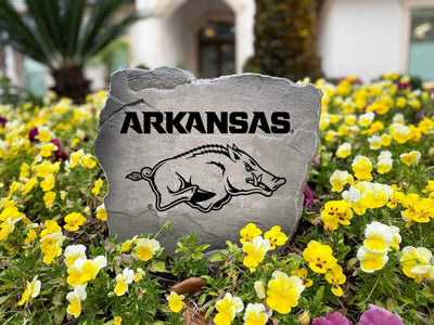Razorbacks logo marker stone showcasing school pride.

