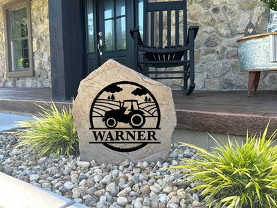 Farm-inspired engraved stone with tractor silhouette, perfect for outdoor gifting.