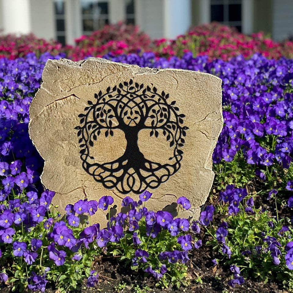 Nature-inspired Tree of Life landscape stone designed to enhance flower beds, walkways, patios, and welcoming front entrances with lasting beauty.
