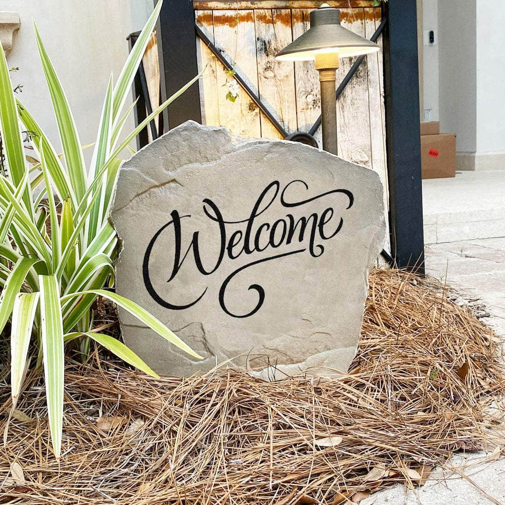 Classic welcome landscape stone designed to greet family and friends with an inviting message that complements any residential setting.