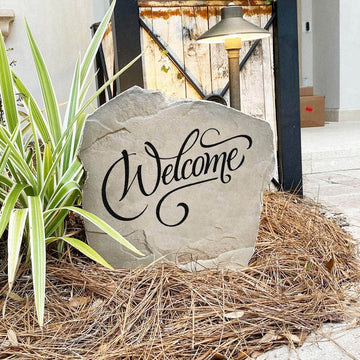 Classic welcome landscape stone designed to greet family and friends with an inviting message that complements any residential setting.