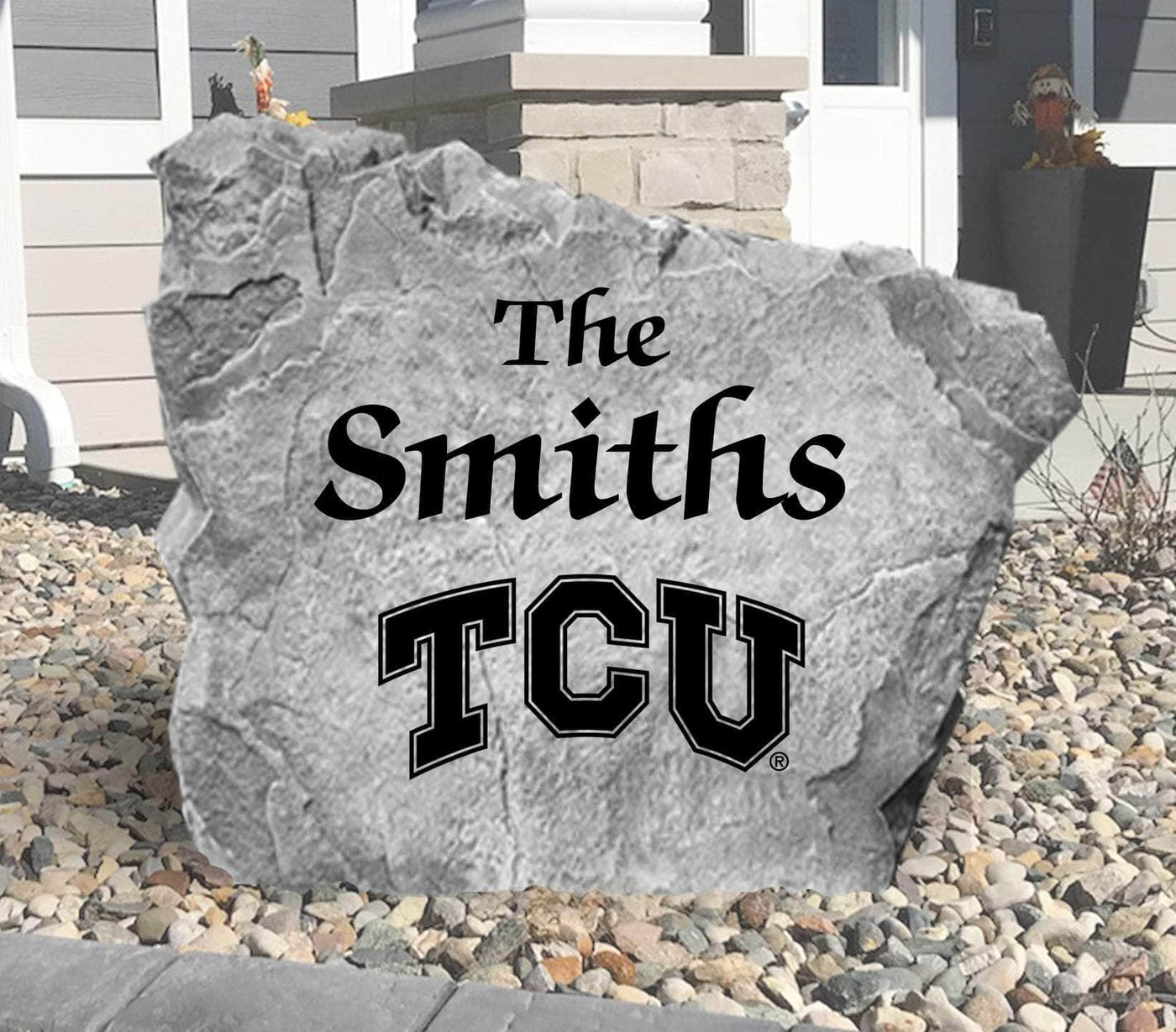 Custom engraved TCU name stone displayed at a home’s front entryway