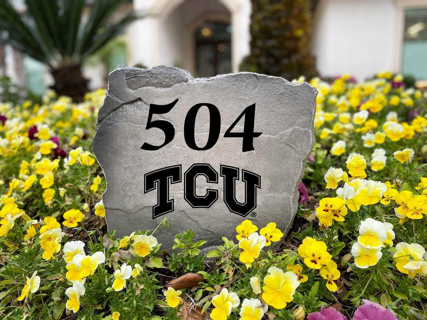 TCU-themed engraved address stone enhancing front porch landscaping