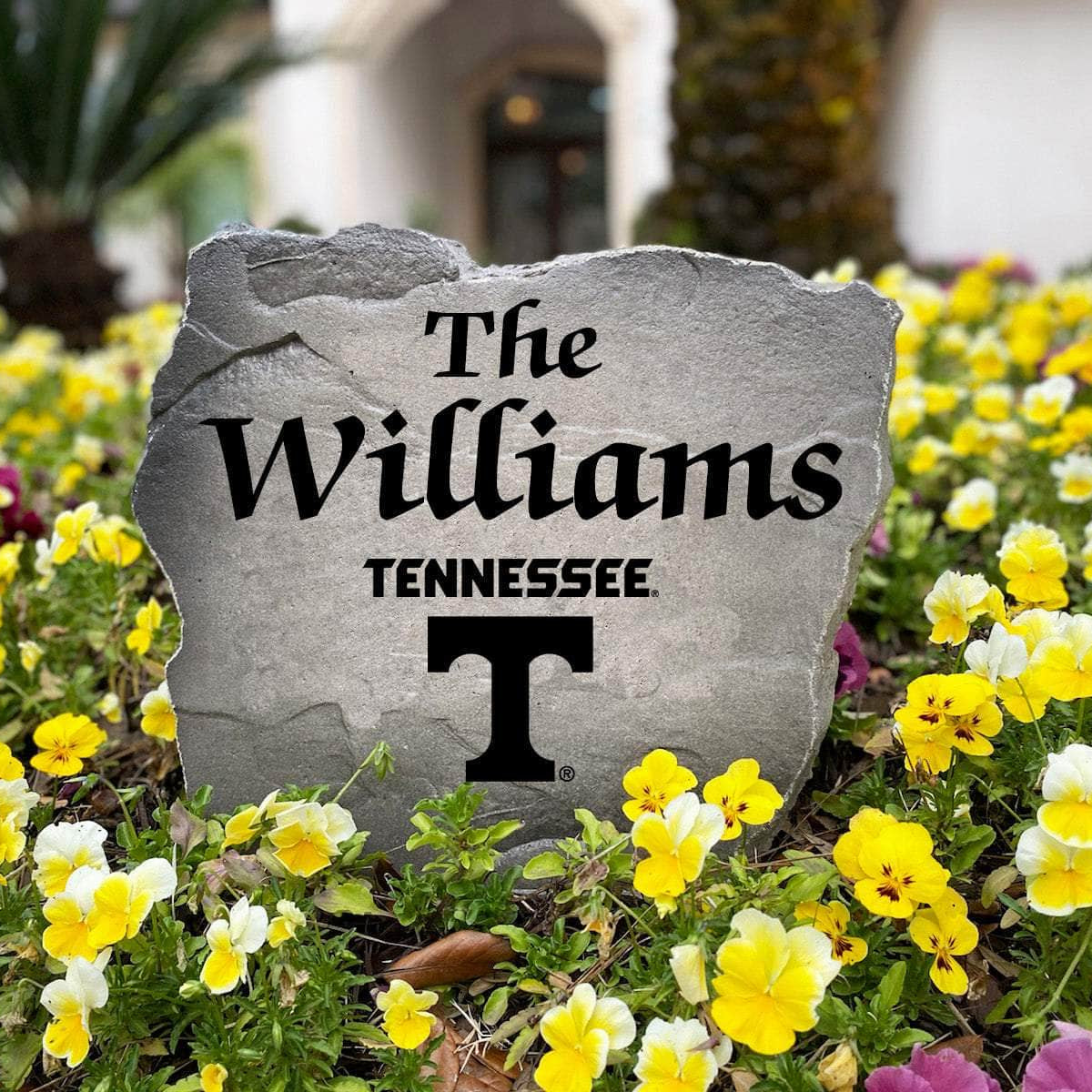 Personalized Tennessee Volunteers outdoor name stone featuring custom family lettering permanently engraved into weather-resistant stone. A thoughtful gift for college football fans, alumni, weddings, housewarmings, and new homeowners.