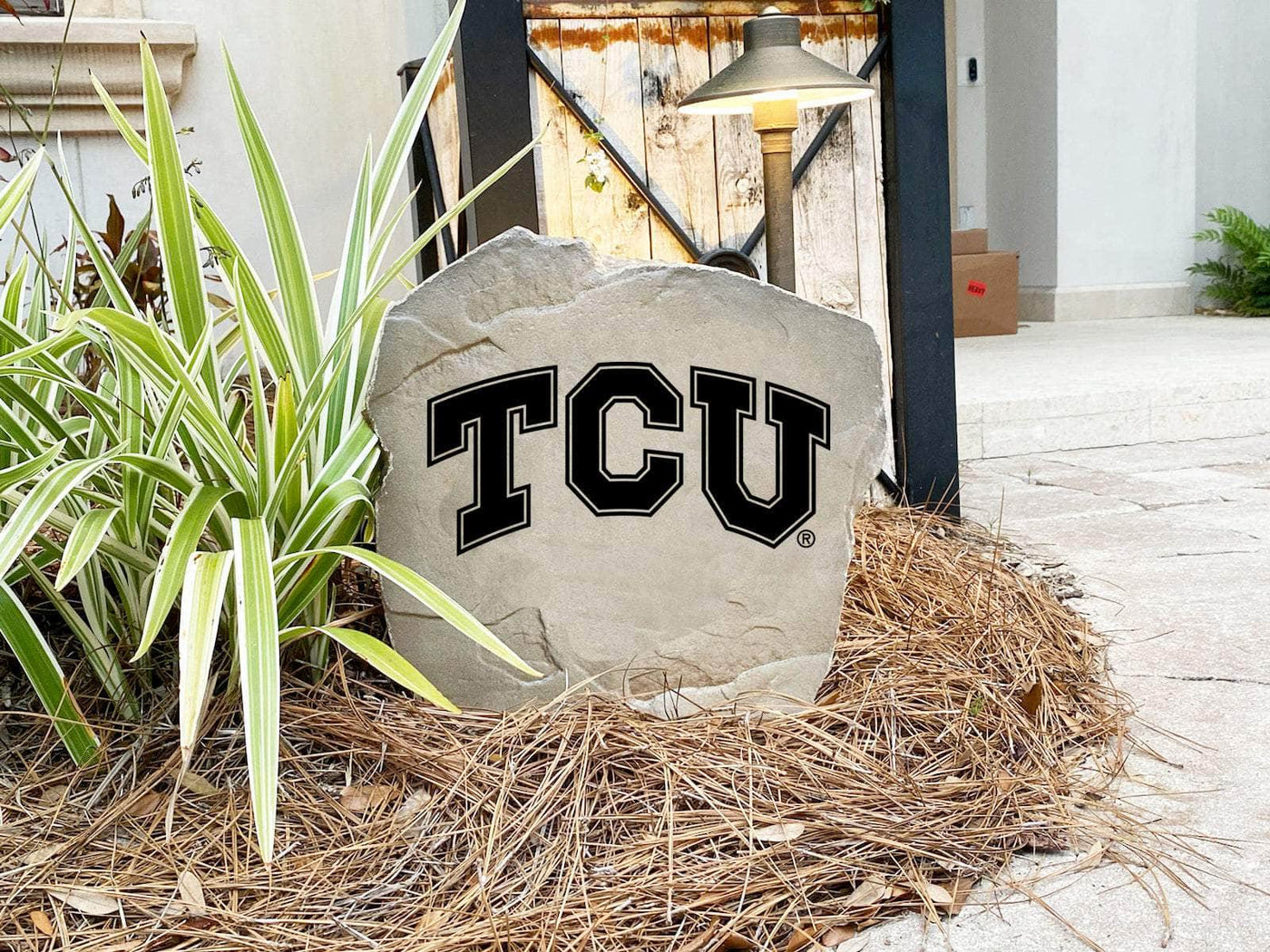 Engraved Texas Christian University stone featuring the official logo