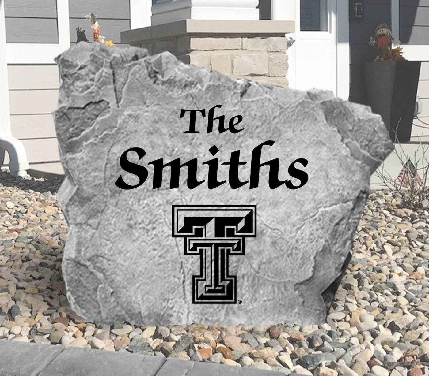 Custom landscaping rock featuring Texas Tech logo and name