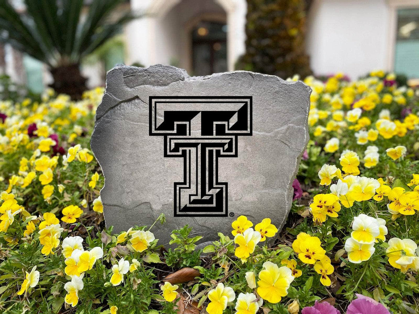 Custom outdoor stone featuring Texas Tech logo design