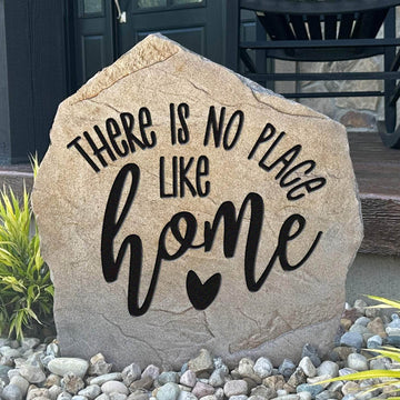 Personalized "There Is No Place Like Home" engraved stone creating a warm and inviting welcome for front yards, gardens, and entryway landscaping.