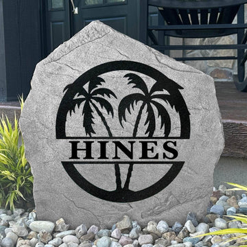 Custom palm tree monogram garden plaque crafted from durable concrete, creating a beautiful coastal accent for patios, walkways, and flower beds.