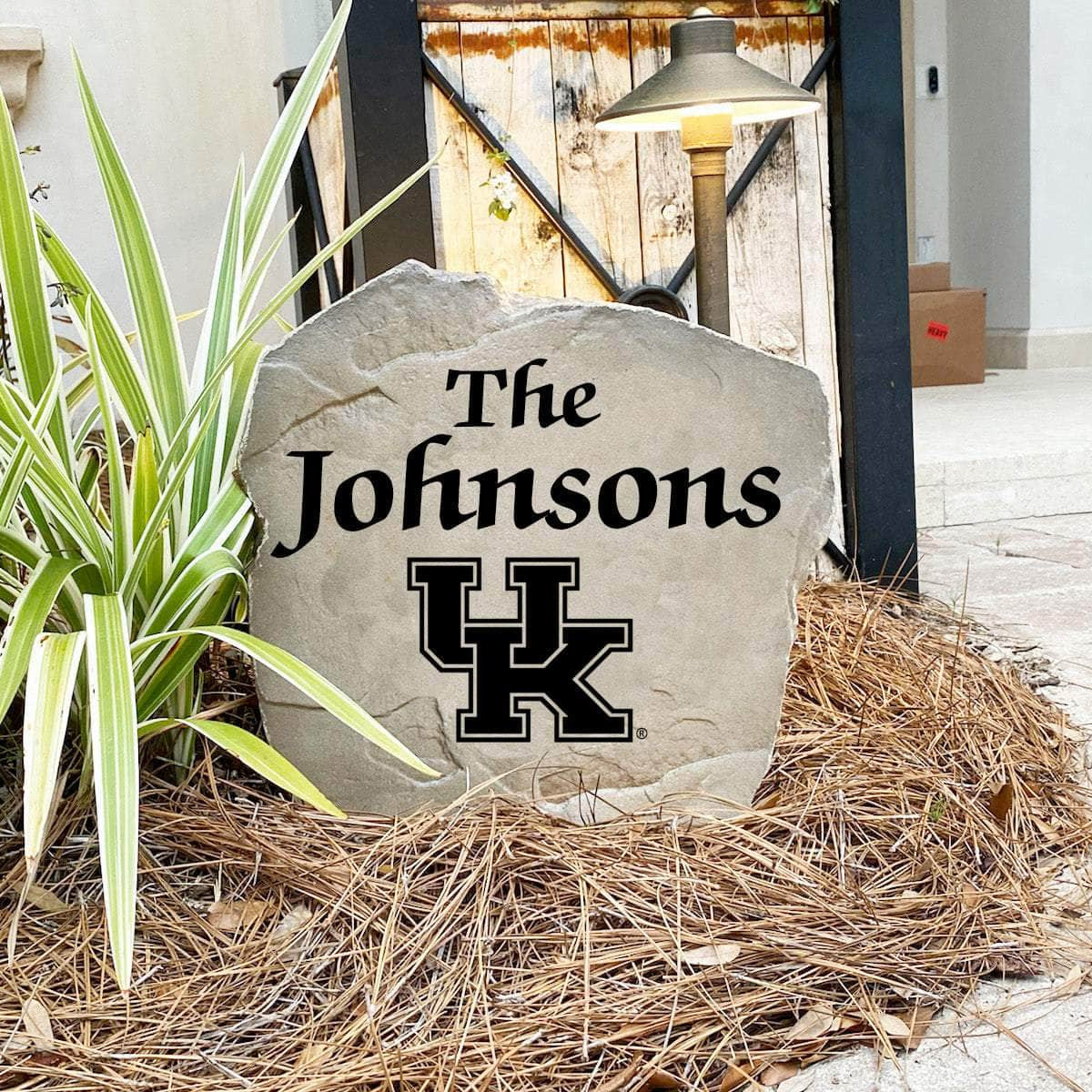 Engraved University of Kentucky Name Stone with a custom family name and the Kentucky Wildcats logo, bringing collegiate spirit and timeless style to front yard landscapes, walkways, and home entrances.