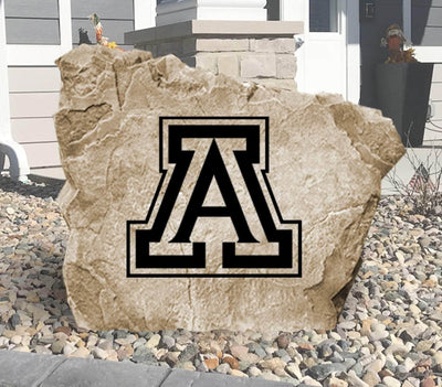 Outdoor engraved stone featuring the University of Arizona Wildcats logo