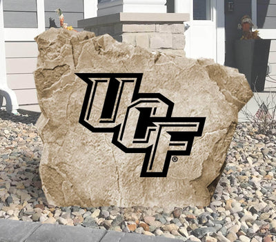 University of Central Florida Knights logo stone displayed in a landscaped yard